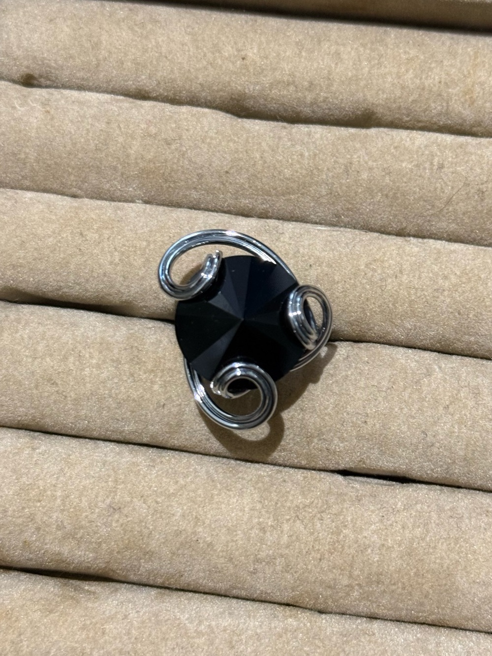 Silver and black stone ring